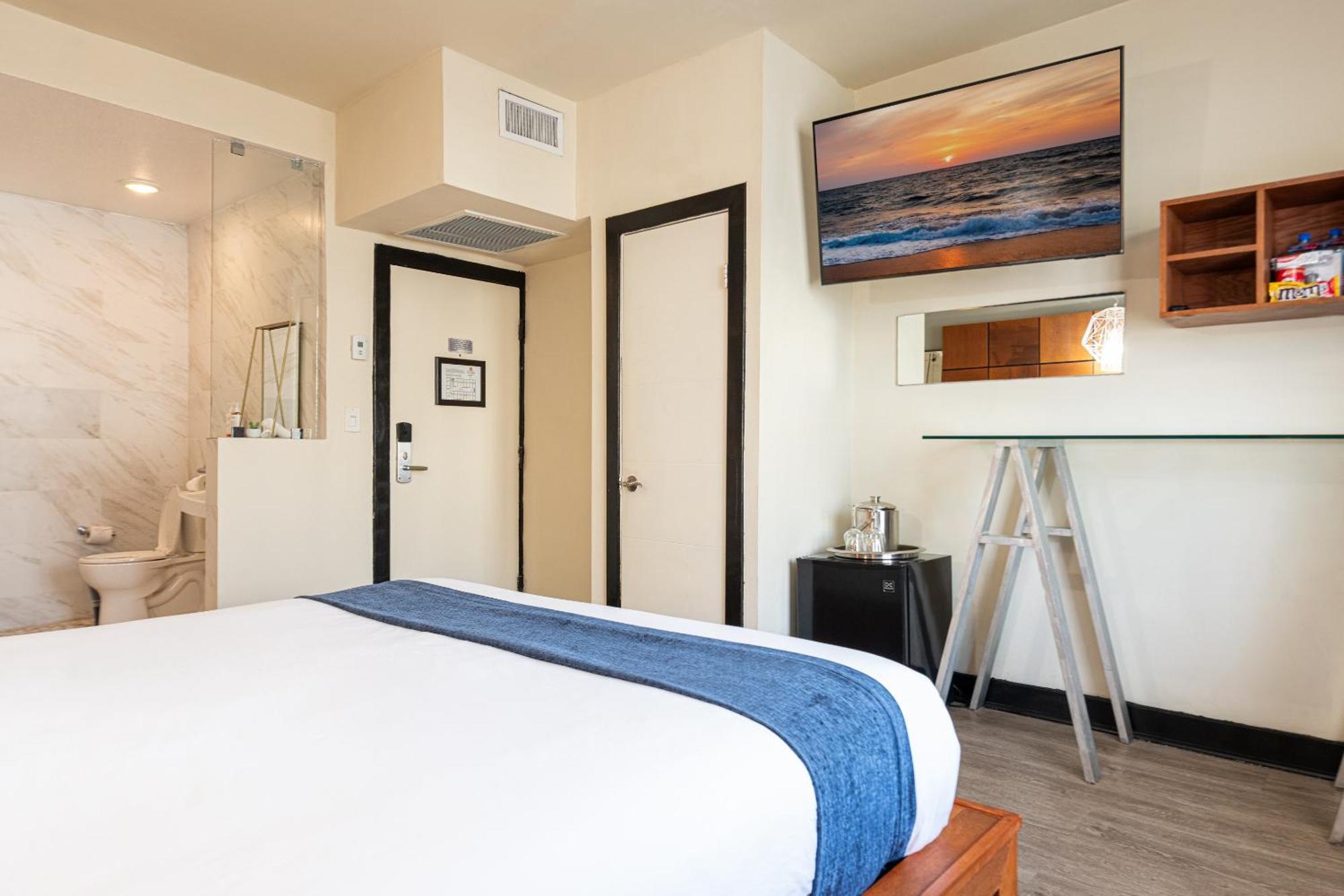 Acomodação Standard com Cama King-size Acessível para Hóspedes com Mobilidade Reduzida